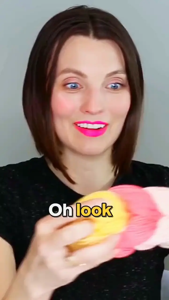 The finished video: the yarn held up to the camera, with a caption on each word